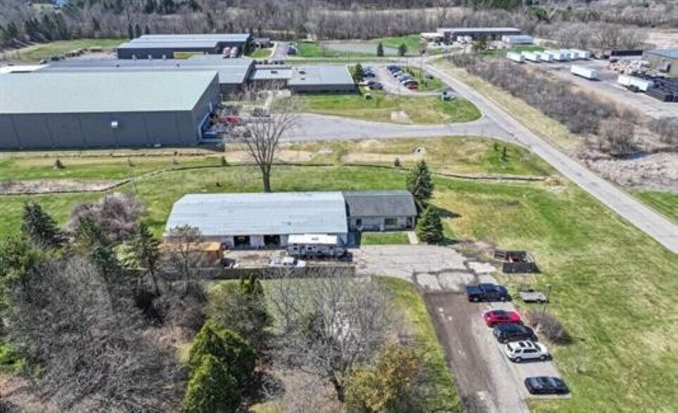 Primary Photo Of 10460 N Holly Rd, Holly Warehouse For Sale