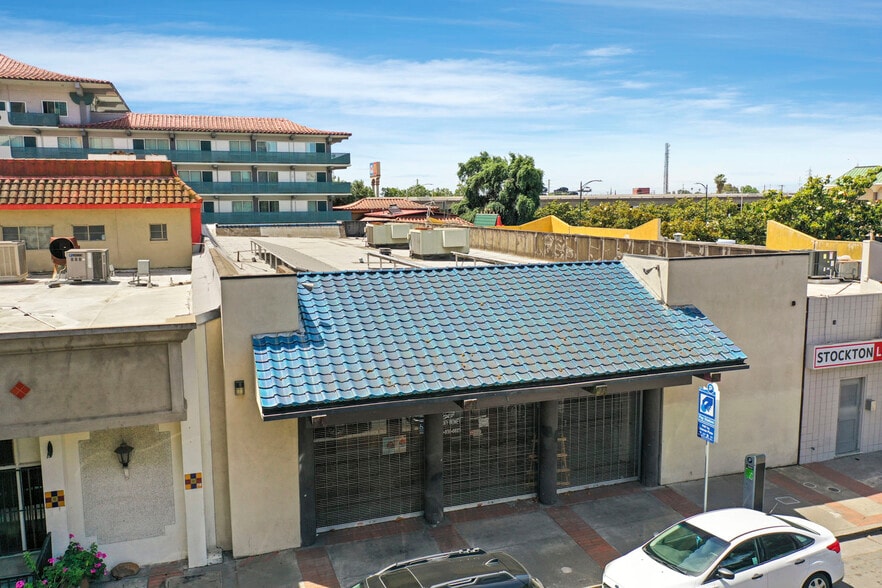 Primary Photo Of 112 E Market St, Stockton Storefront For Sale