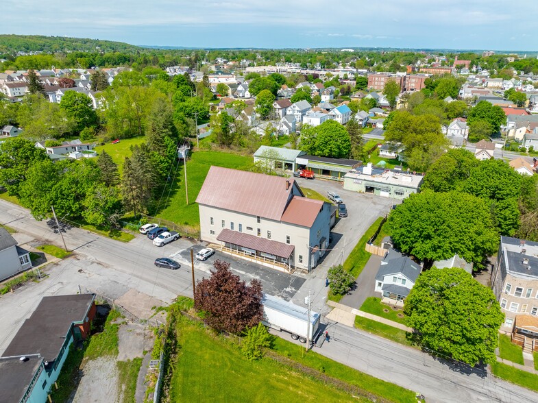 Primary Photo Of 1122 Kossuth Ave, Utica Storefront Retail Office For Sale