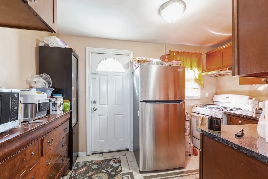 More Photos Of 100-10-100-12 103rd Ave, Ozone Park Multifamily For Sale