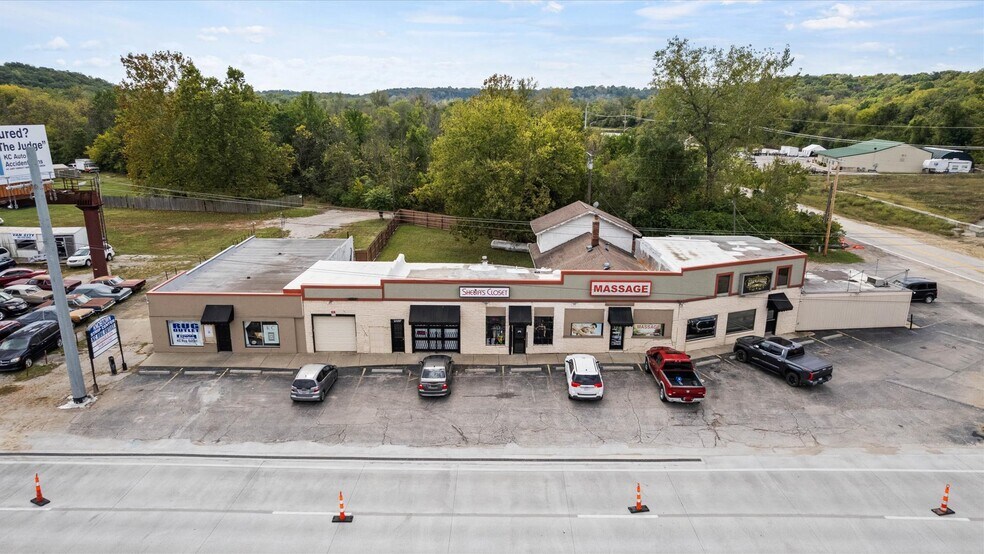 Primary Photo Of 13101-13109 E Blue Pky, Kansas City Freestanding For Sale