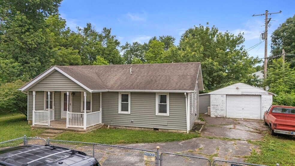Primary Photo Of 305 S Ferguson St, Henryville General Retail For Sale