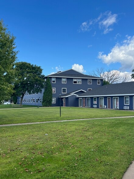 Primary Photo Of 350-360 E Birch Ave, Barron Apartments For Sale