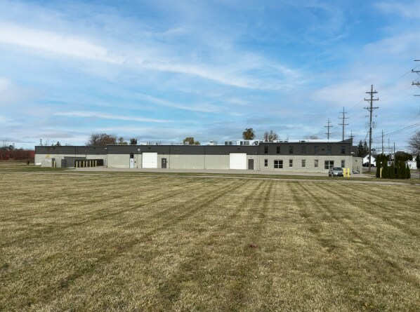 Primary Photo Of 244 S Court St, Lapeer Manufacturing For Sale
