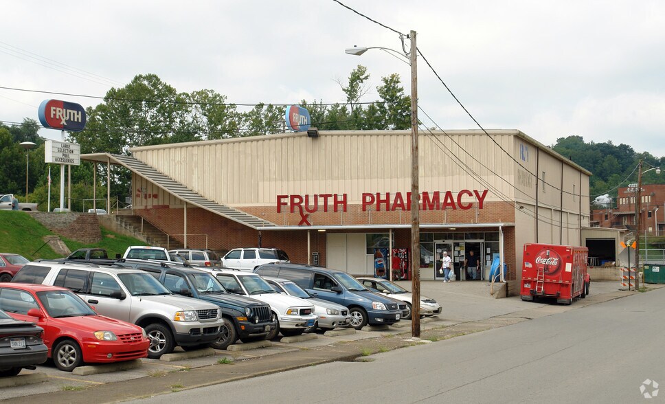 More Photos Of 104-106 Parking Plz, Spencer Storefront For Sale