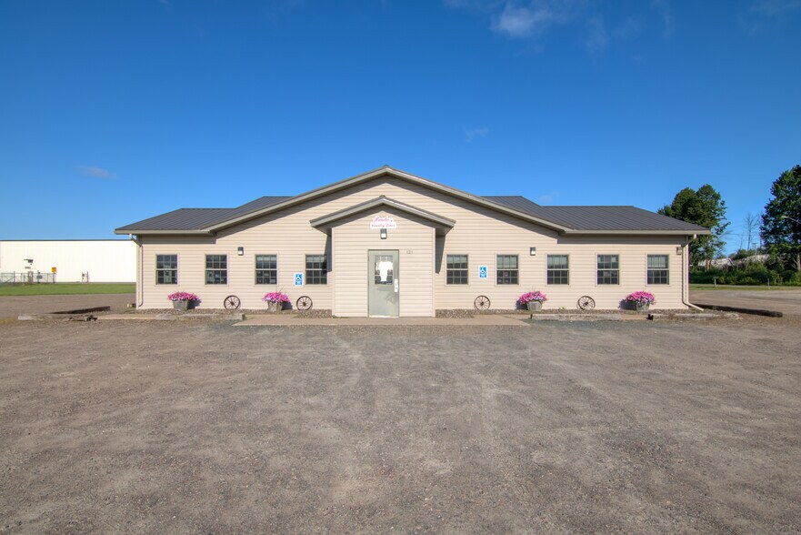 Primary Photo Of 121 Division St, Withee General Retail For Sale