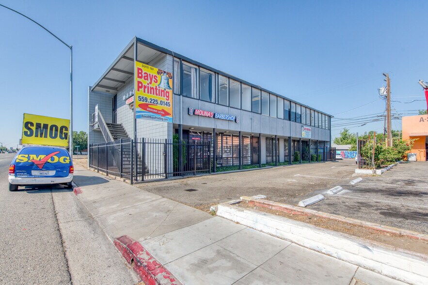 Primary Photo Of 2921 N Blackstone Ave, Fresno Office Residential For Sale