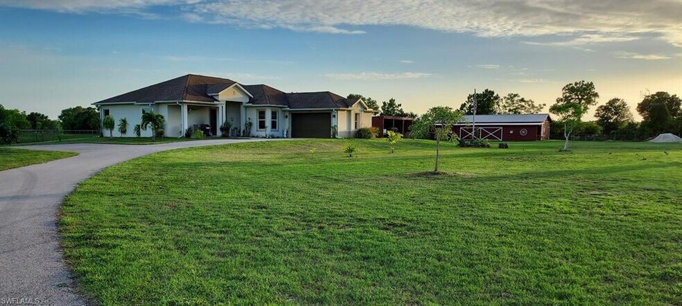More Photos Of 2310 70th Ave NE, Naples Specialty For Sale