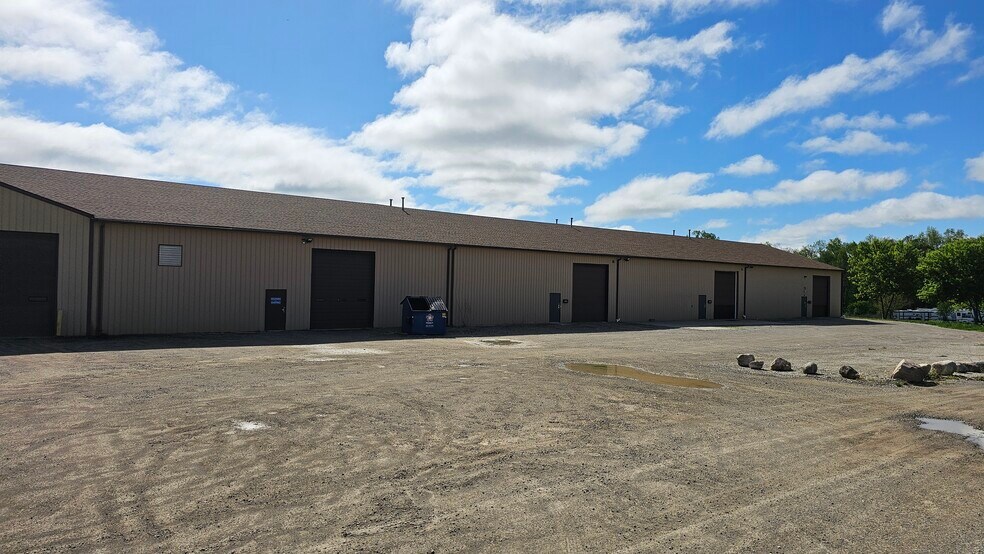More Photos Of 5684 E Highland Rd, Howell Warehouse For Lease