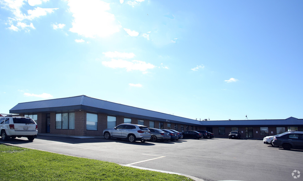 More Photos Of 2018 Mallard Rd, London Showroom For Lease