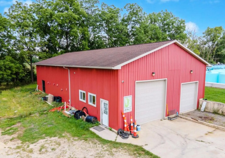 Primary Photo Of 10601 Bennett Dr, Morrice Warehouse For Sale
