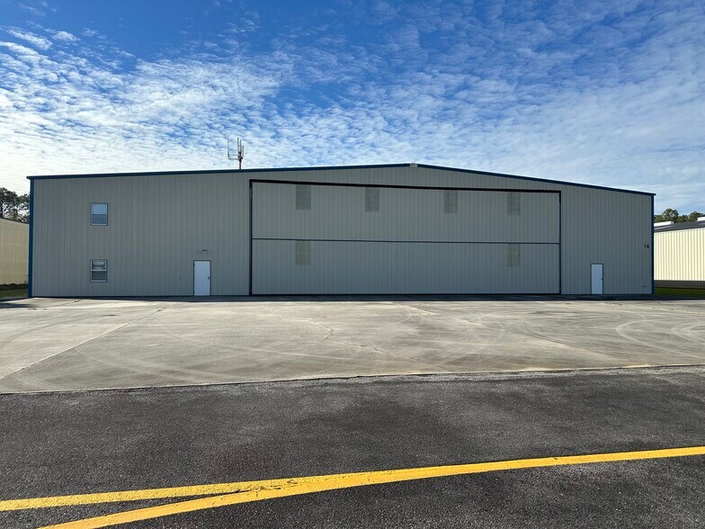 Primary Photo Of Airport Dr, Gulf Shores Airplane Hangar For Sale