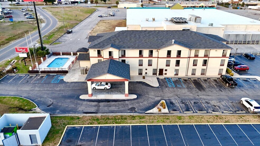 More Photos Of 5635 Tillmans Corner Pky, Theodore Hotel For Sale