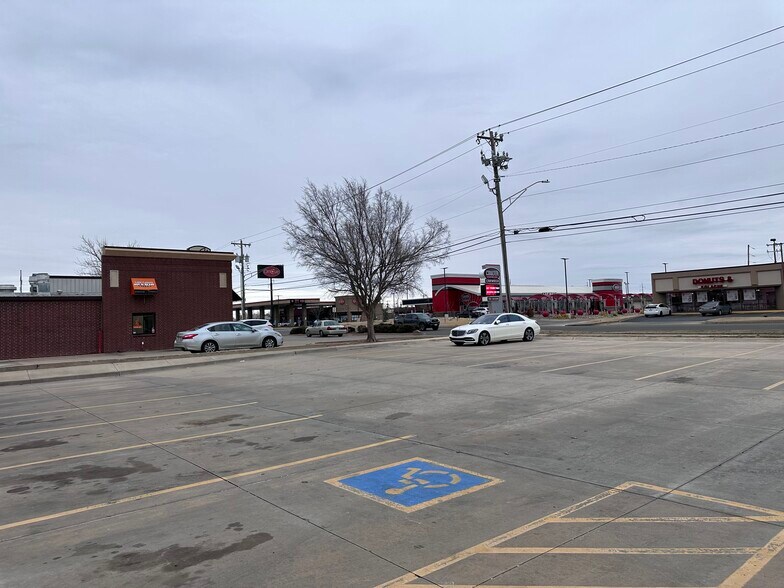 More Photos Of 10717 N May Ave, The Village Storefront For Lease