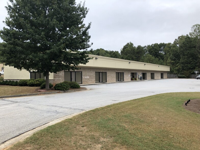 Primary Photo Of 10714 Covington by Pass Rd, Covington Storefront Retail Office For Sale