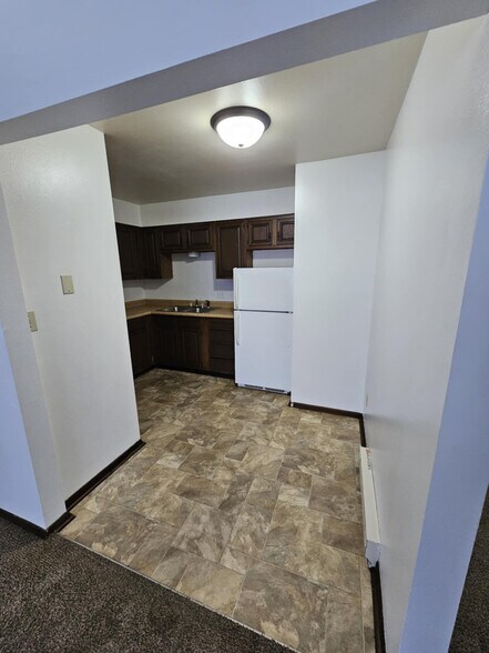 More Photos Of 115 S 5th Ave W, Newton Apartments For Sale