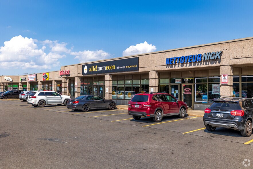 Primary Photo Of 239-245 Boul Samson, Laval Freestanding For Lease