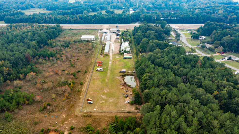 Primary Photo Of Highway 242 (behind 17111 Highway 242 - 2 AC), Conroe Land For Sale