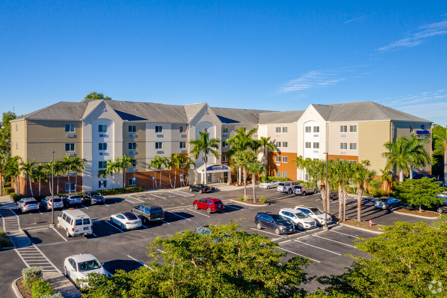 Primary Photo Of 9740 Commerce Center Ct, Fort Myers Hotel For Sale