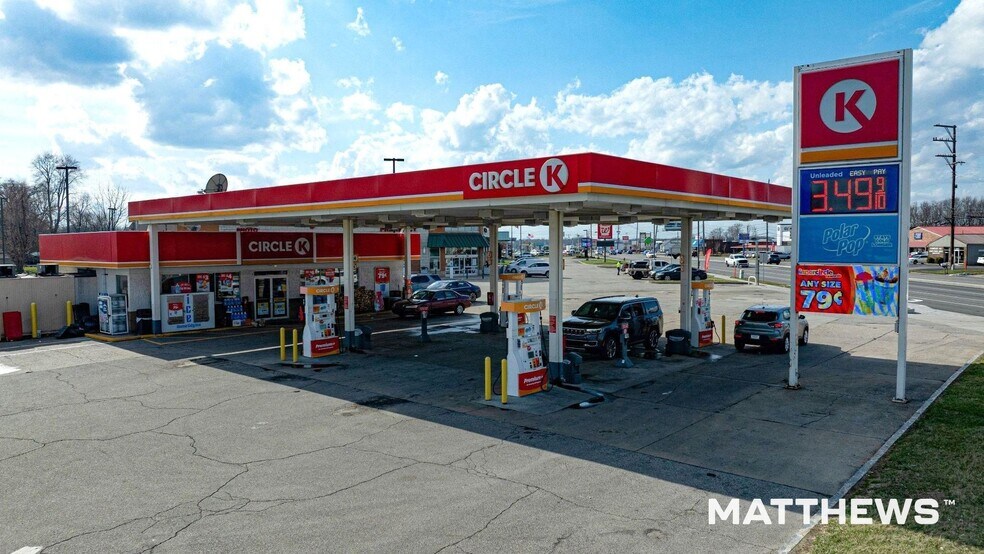 Primary Photo Of 115 Clifty Dr, Madison Convenience Store For Sale