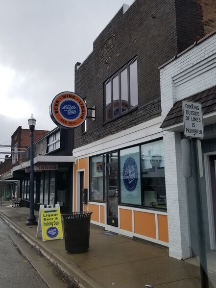 Primary Photo Of 108 S Main St, Scottville Storefront Retail Residential For Sale