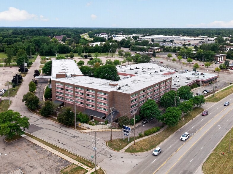 Primary Photo Of 6820 S Cedar St, Lansing Hotel For Sale