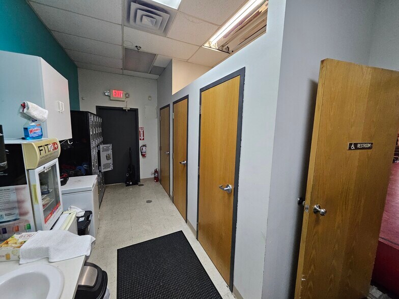 More Photos Of 21305-2135 John Milless Dr, Rogers General Retail For Lease