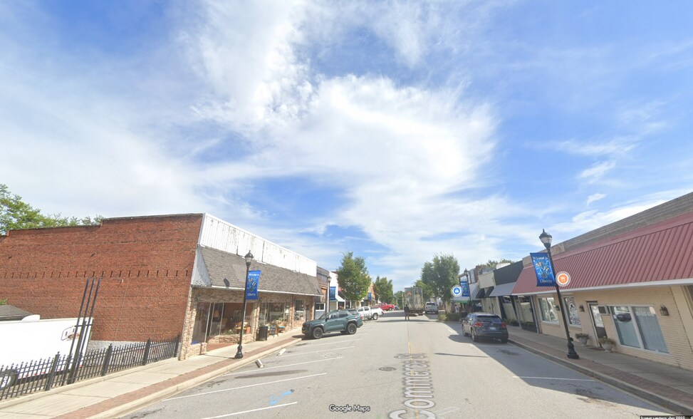 More Photos Of 15-17 S Commerce St, Liberty Storefront For Sale