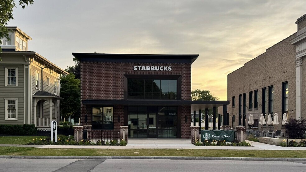 Primary Photo Of 64 S Main St, Fairport General Retail For Sale