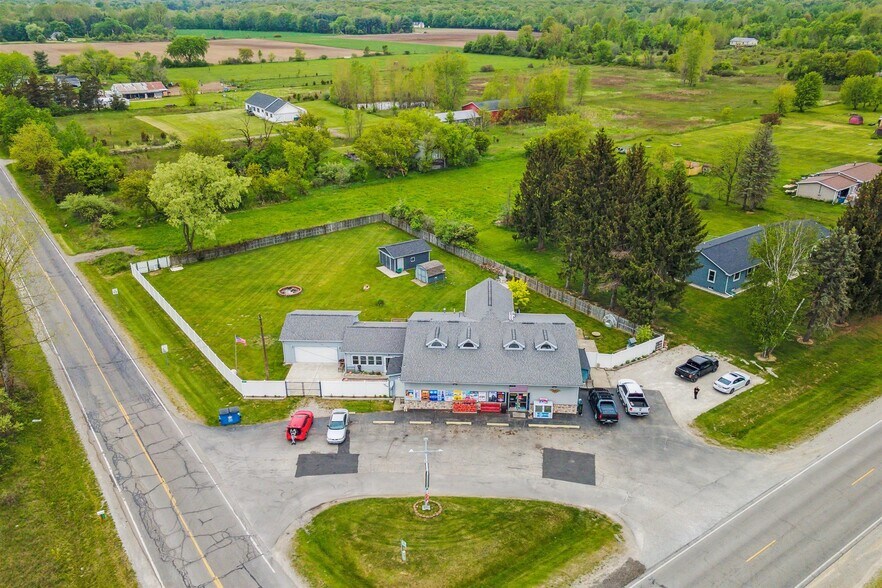 Primary Photo Of 7010 Frances Rd, Flushing Convenience Store For Sale