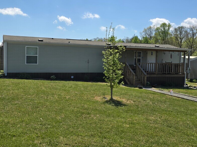 More Photos Of 13 Evergreen Cir, Dunlap Trailer Camper Park For Sale