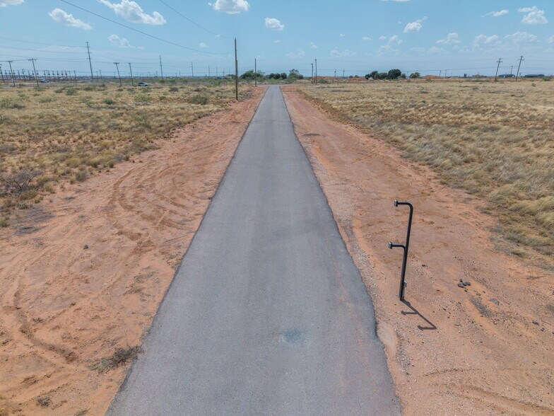 More Photos Of 6708 N County Road 1150, Midland Contractor Storage Yard For Sale