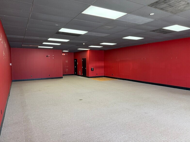 More Photos Of 200 W Clinton St, Gray Storefront For Lease