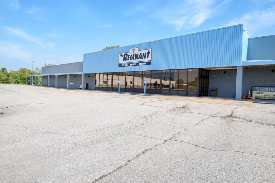 Primary Photo Of 300-314 E Main St, Parsons Freestanding For Sale