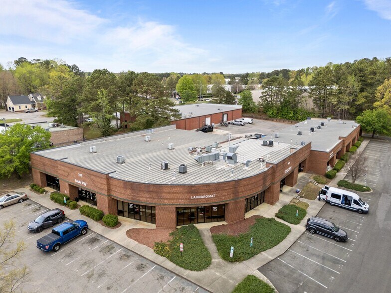 Primary Photo Of 2411 E Millbrook Rd, Raleigh General Retail For Lease