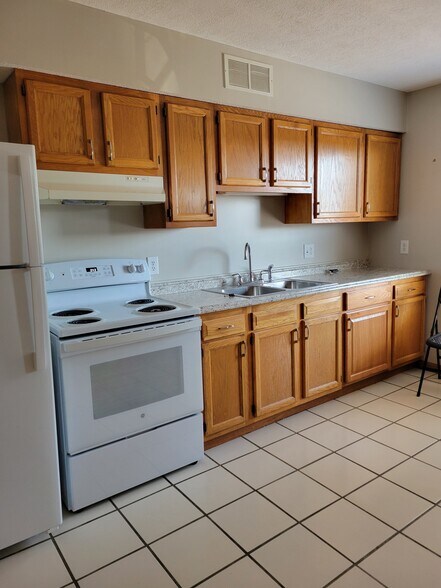 More Photos Of 547 Ridge Ave NE, New Philadelphia Apartments For Sale