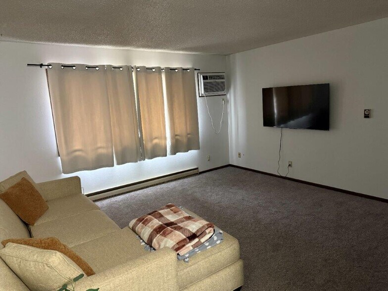 More Photos Of 115 S 5th Ave W, Newton Apartments For Sale