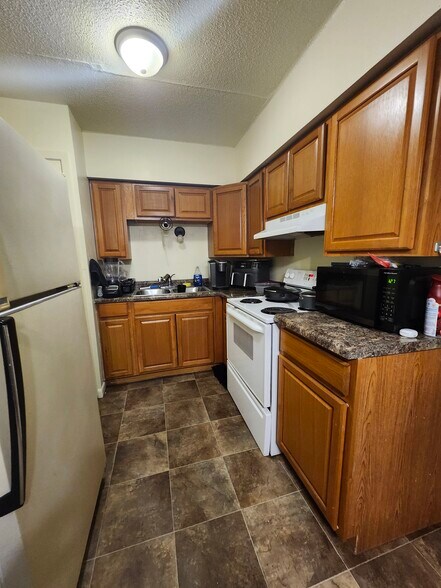 More Photos Of 204 3rd St SW, Rake Apartments For Sale