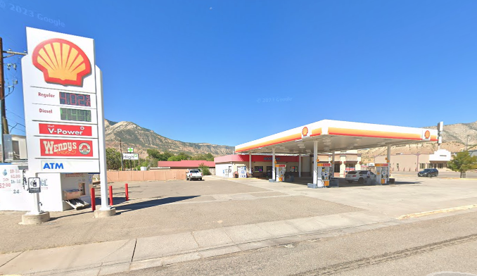 Primary Photo Of 201 Columbine Ct, Parachute Service Station For Sale