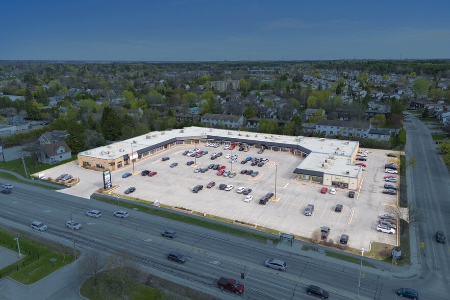 Primary Photo Of 2190-2194 Robertson Rd, Ottawa Freestanding For Sale