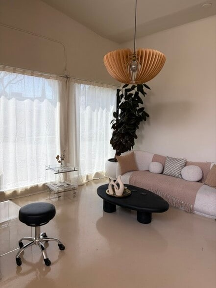 Primary Photo Of 7701-7703 Santa Monica Blvd, Los Angeles Freestanding For Lease