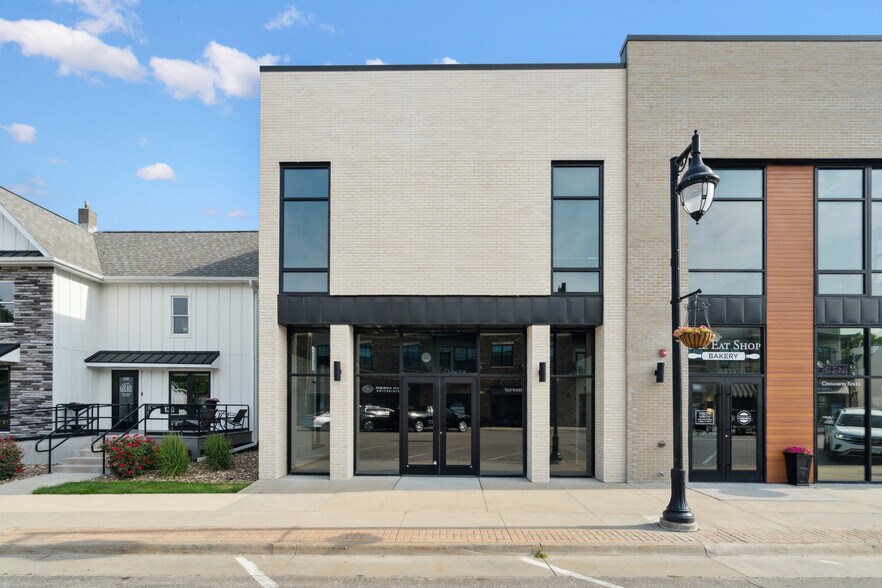 Primary Photo Of 120 W Main St, Solon Storefront For Sale
