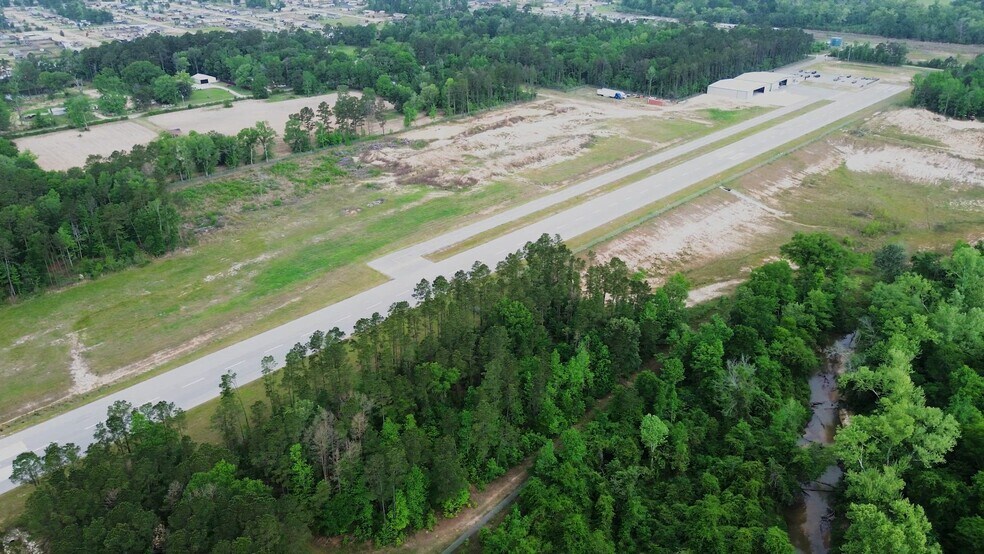Primary Photo Of 15900 Schank Rd, Conroe Airport For Sale