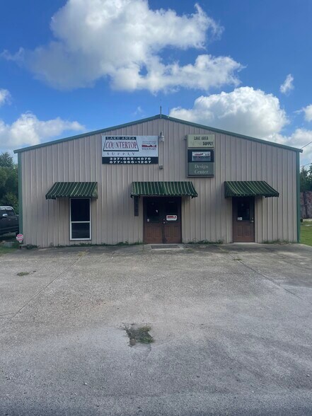 Primary Photo Of 130 Victoria Dr, Moss Bluff Distribution For Sale