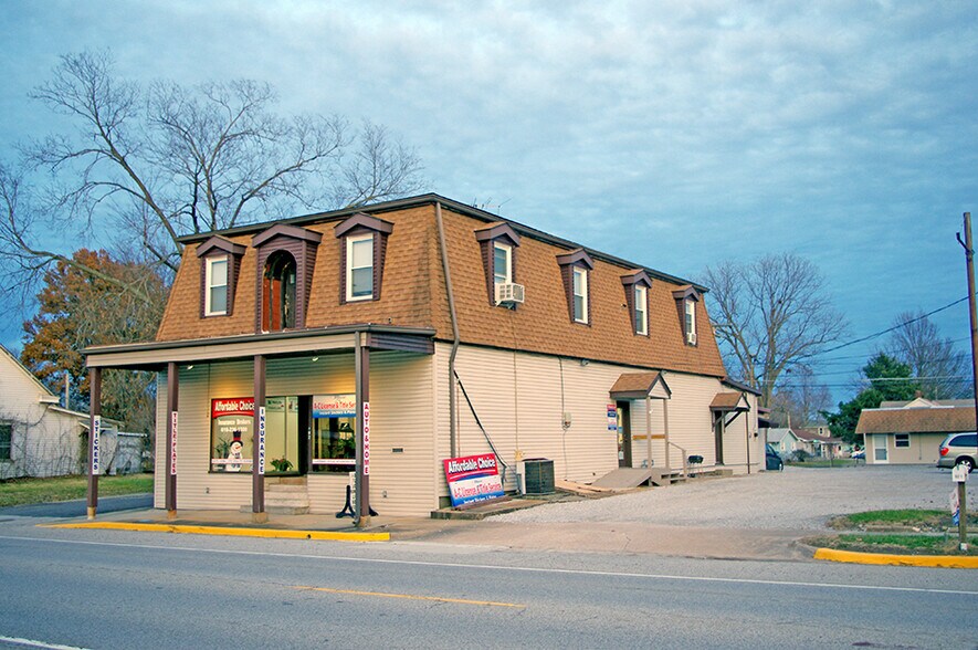 Primary Photo Of 102 S Main St, Smithton Storefront Retail Residential For Sale