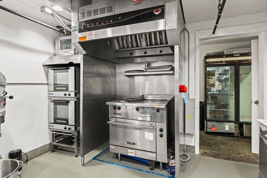 More Photos Of 114 E Main St, Manhattan Storefront Retail Office For Sale