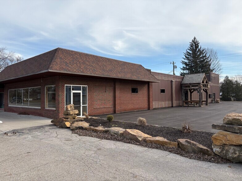 Primary Photo Of 901 E 9th St, Rochester Showroom For Sale