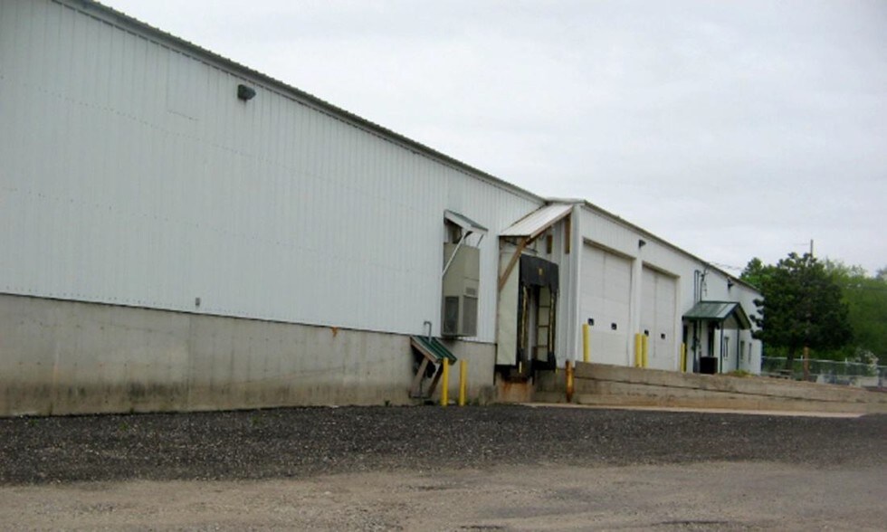 More Photos Of 111 W River St, Cadillac Distribution For Lease