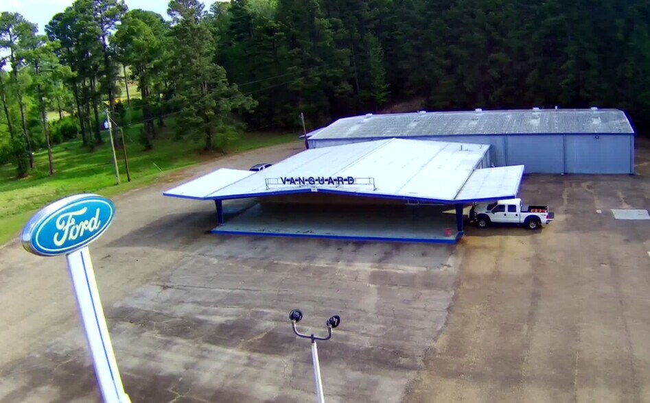 Primary Photo Of 143 Texas Highway 49, Hughes Springs Auto Repair For Sale