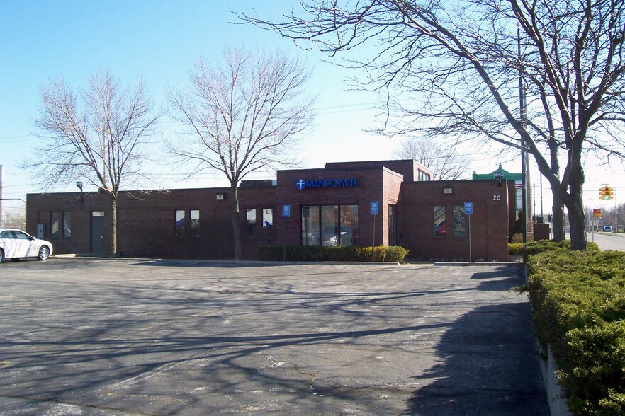 Primary Photo Of 20 W Muskegon Ave, Muskegon Office For Sale